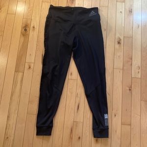 Adidas Primeblue Leggings with sides mesh crisscross design.  Sexy and subtle